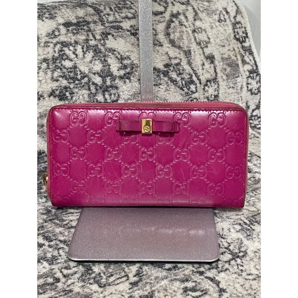 Gucci Guccissima Bow Zip Around Long Wallet in Fuschia